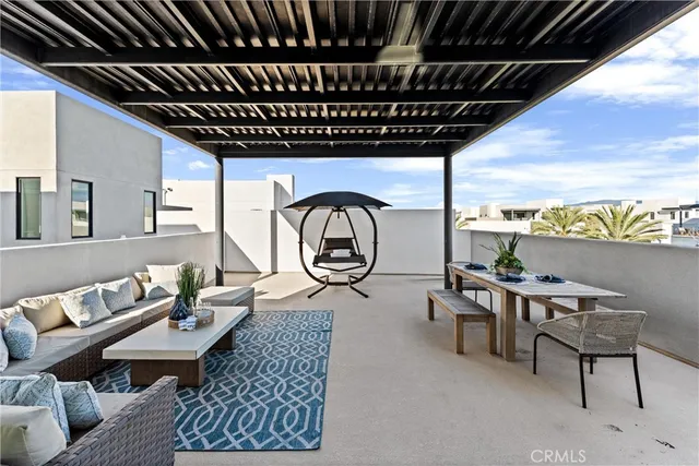 a front view of a residential apartment building with a yard