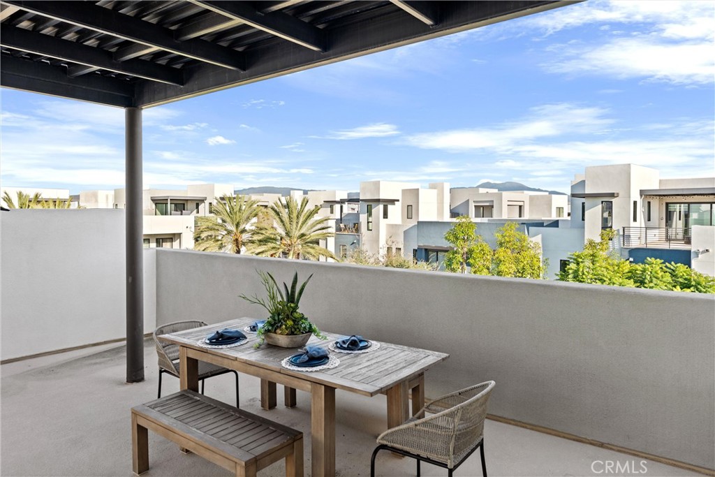 419 Transport Tustin, CA 92782 - Photo 39 of 58 a view of a balcony dining table and chairs