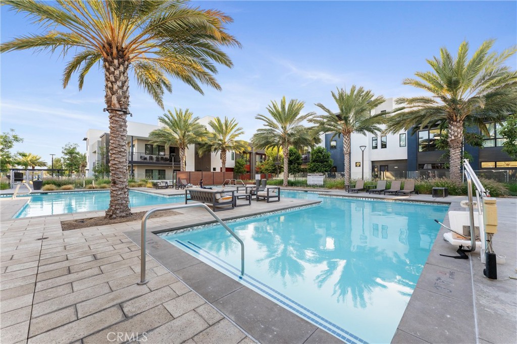 419 Transport Tustin, CA 92782 - Photo 52 of 58 a view of swimming pool with outdoor seating and yard in the back