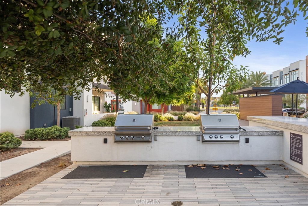 419 Transport Tustin, CA 92782 - Photo 57 of 58 a view of a house with sitting area and garden