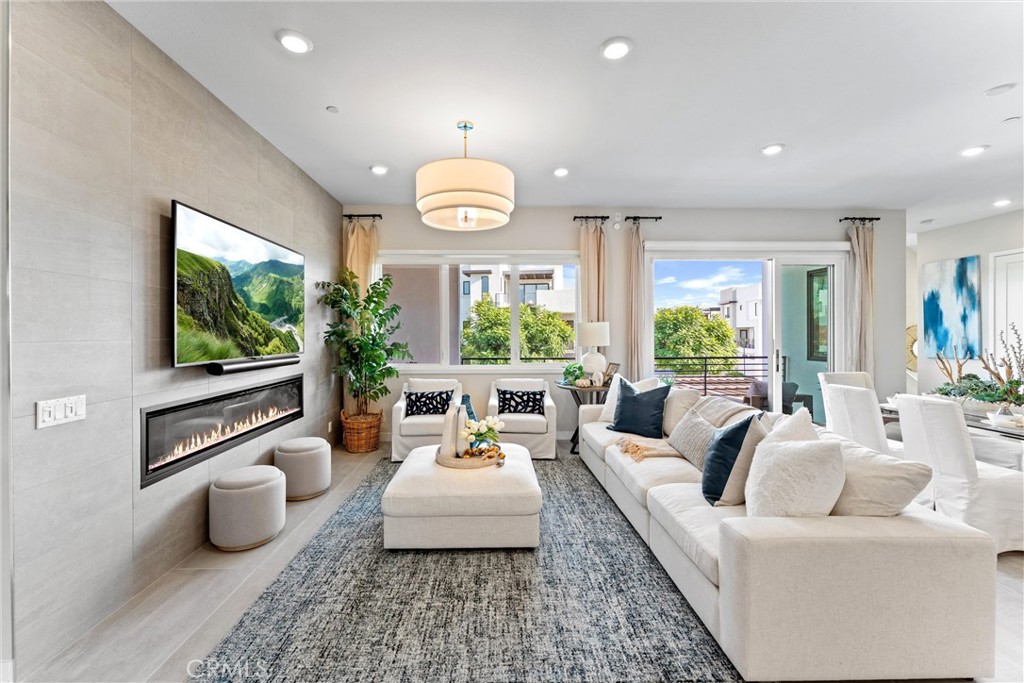 419 Transport Tustin, CA 92782 - Photo 8 of 58 a living room with furniture and a large window