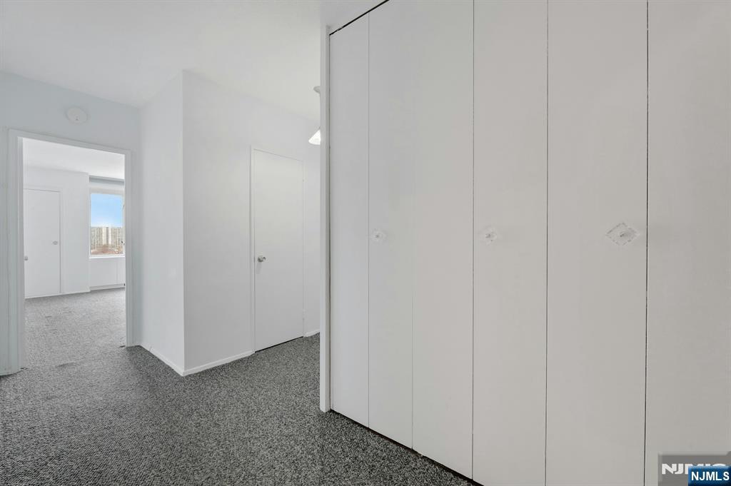 6 Horizon Road, Unit 1508 Fort Lee, NJ 07024 - Photo 31 of 46 a view of a livingroom and closet area