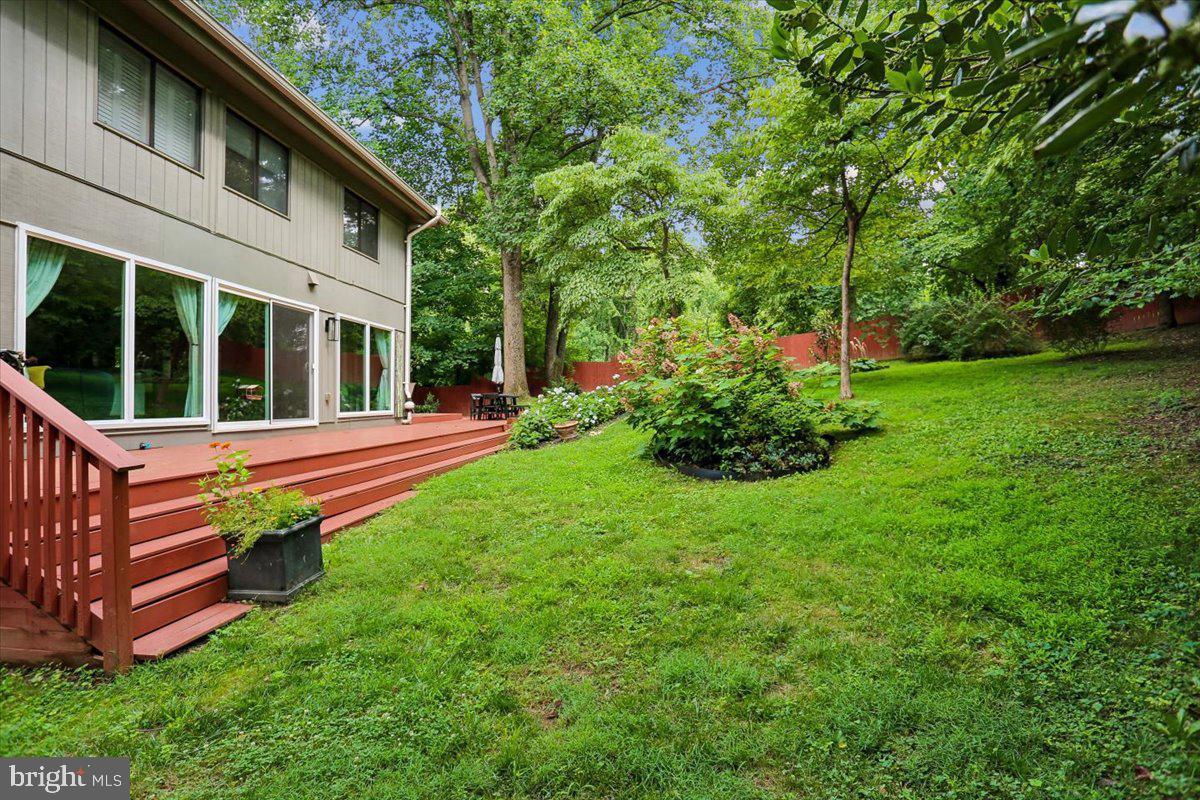 7614 Carteret Road Bethesda, MD 20817 - Photo 21 of 31 Backyard retreat with lush greenery.