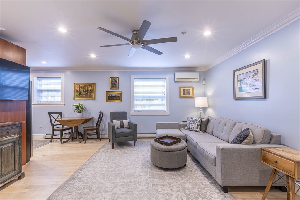 52 Cooper Street, Unit 2 Boston, MA 02113 - Photo 6 of 15 a living room with furniture and a window