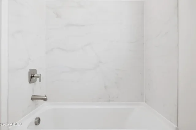 a close up of a bathtub