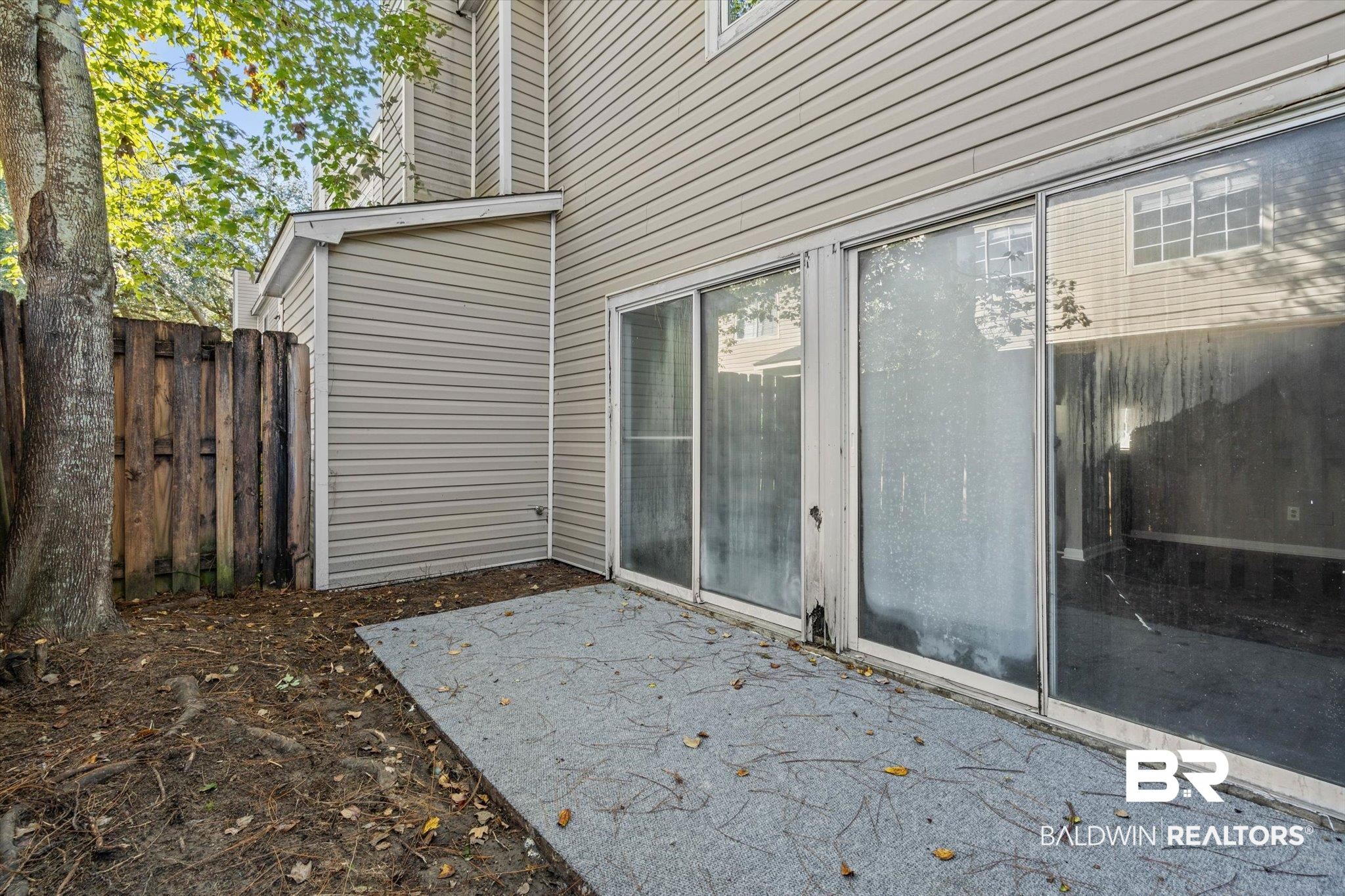 6701 Dickens Ferry Road, Unit 100 Mobile, AL 36608 - Photo 18 of 24 View of patio