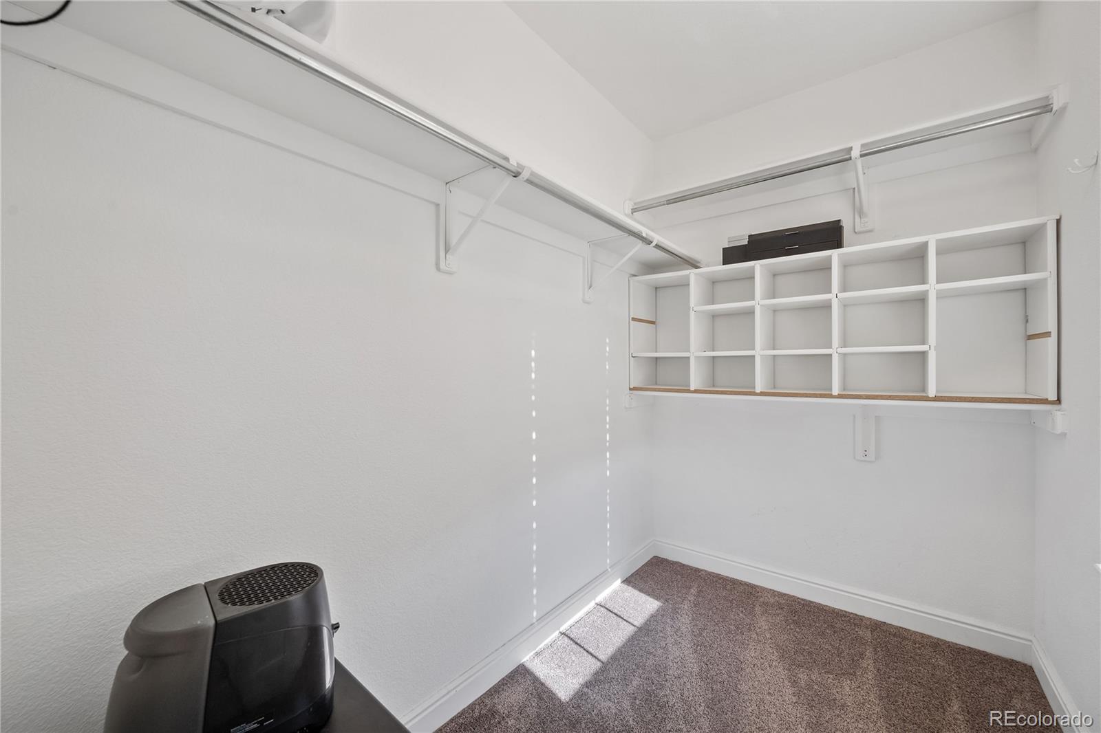 1201 Riddlewood Road Highlands Ranch, CO 80129 - Photo 21 of 36 a view of an empty room with a window