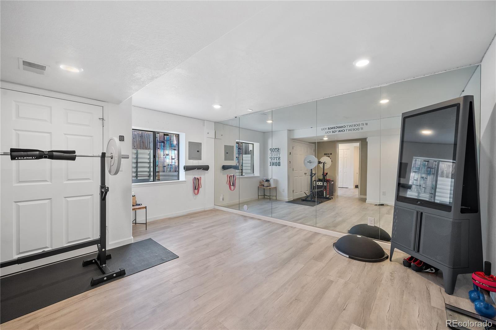 1201 Riddlewood Road Highlands Ranch, CO 80129 - Photo 30 of 36 a view of a living room and kitchen
