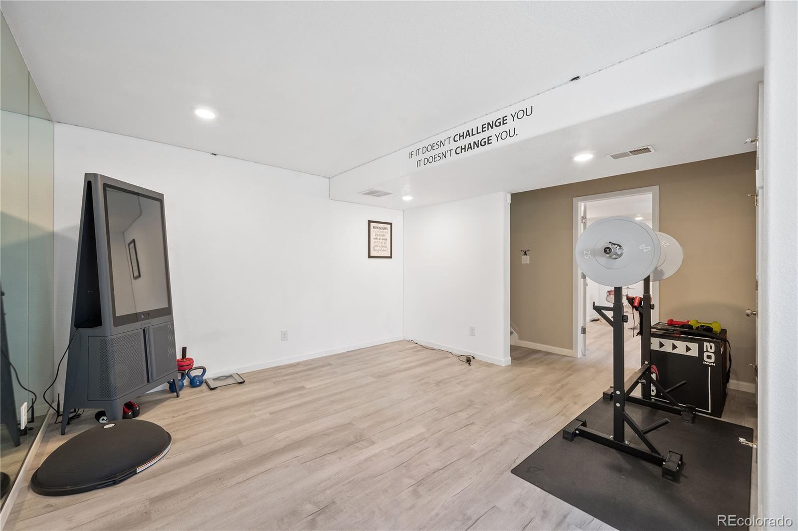 1201 Riddlewood Road Highlands Ranch, CO 80129 - Photo 31 of 36 a view of a room with gym equipment
