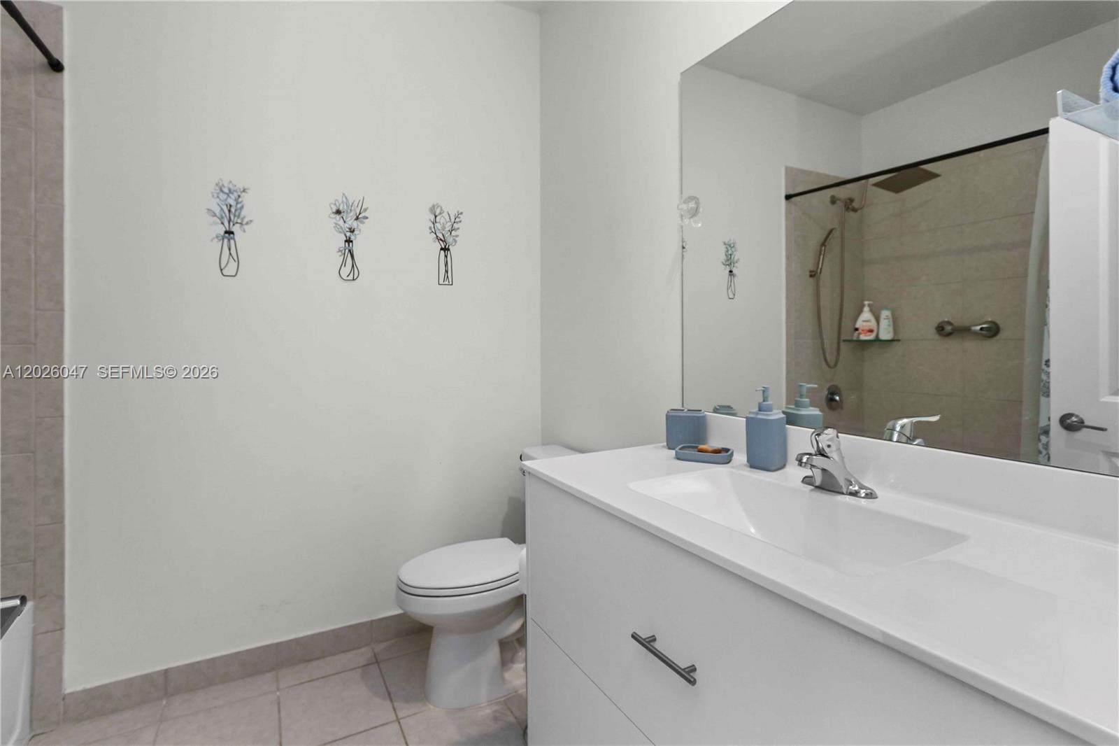 12862 Southwest 231st Street Miami, FL 33170 - Photo 23 of 30 a bathroom with a sink toilet and shower
