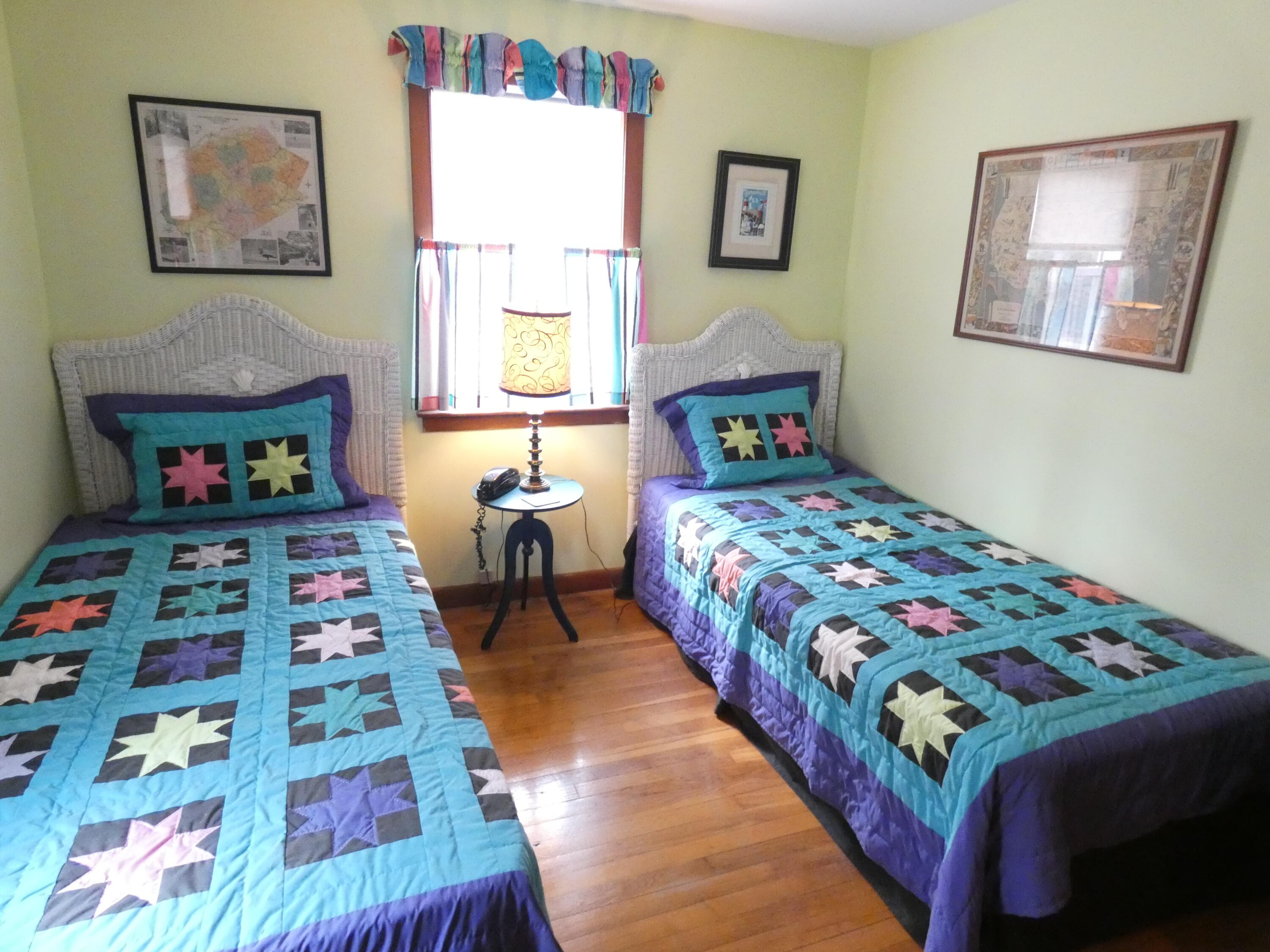 188 Swan River Road West Dennis, MA 02670 - Photo 13 of 39 a bedroom with a bed and a dresser