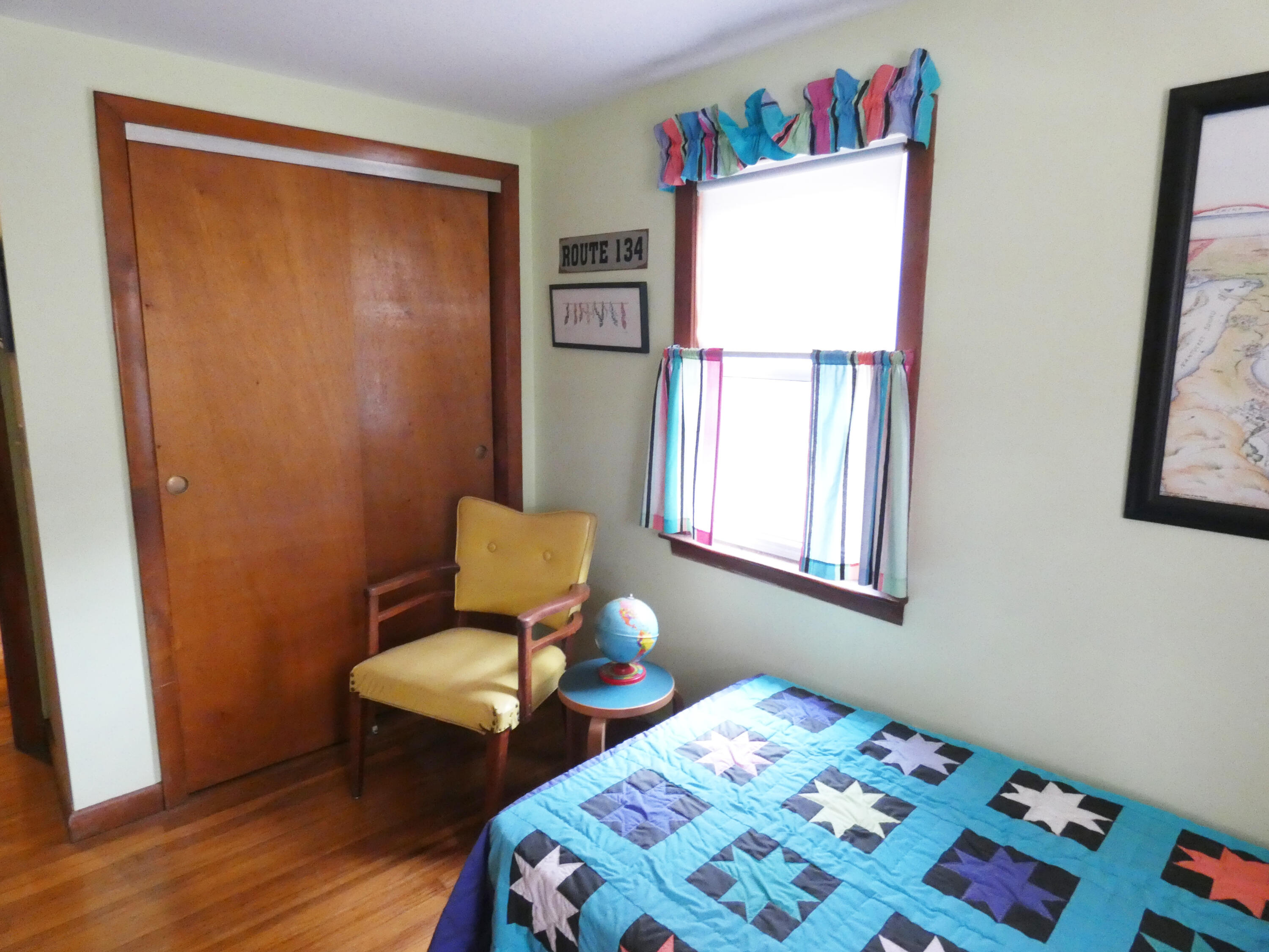 188 Swan River Road West Dennis, MA 02670 - Photo 14 of 39 a bedroom that has a bed and a dresser in it