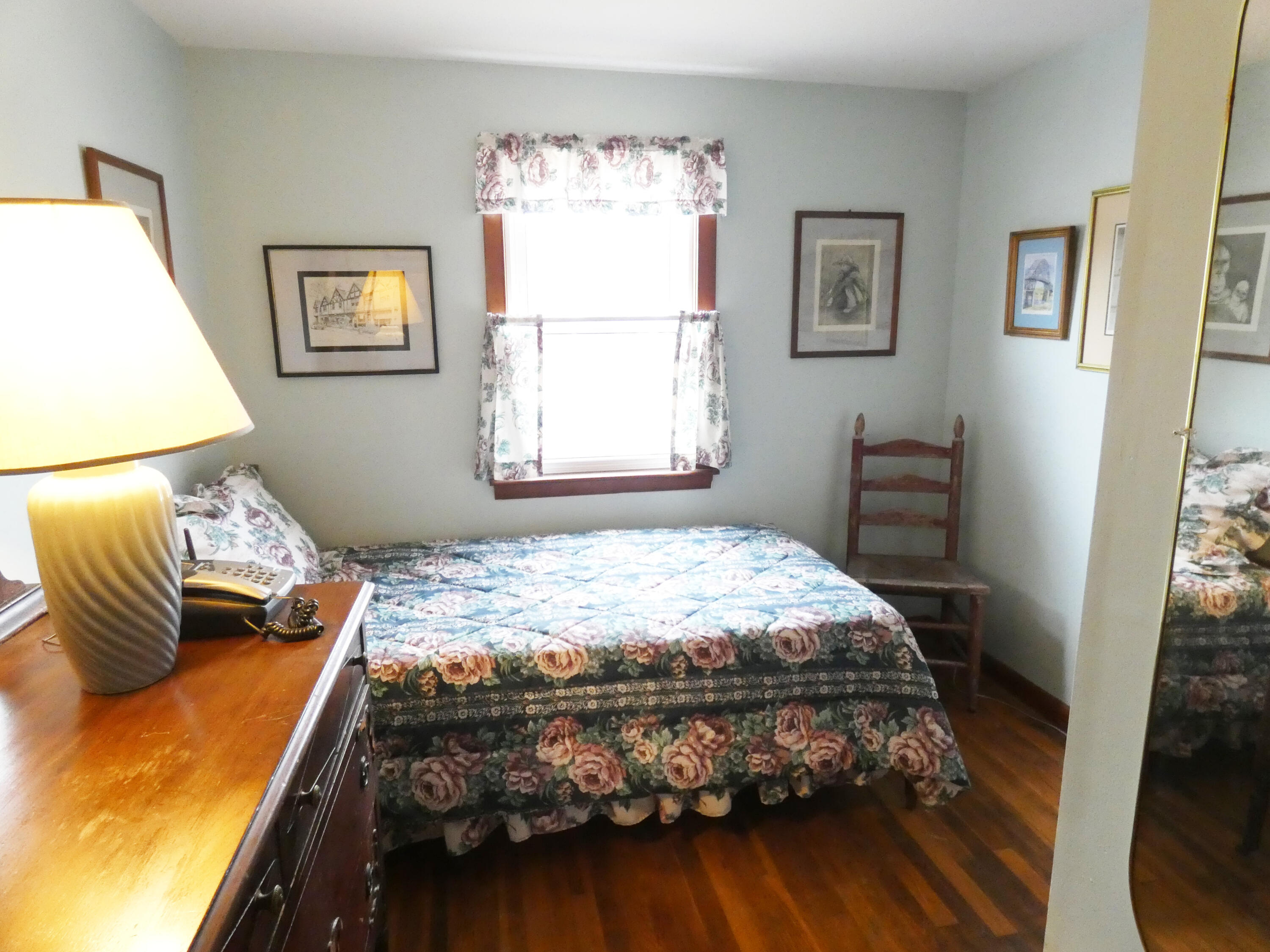 188 Swan River Road West Dennis, MA 02670 - Photo 15 of 39 a bedroom with a bed and a window