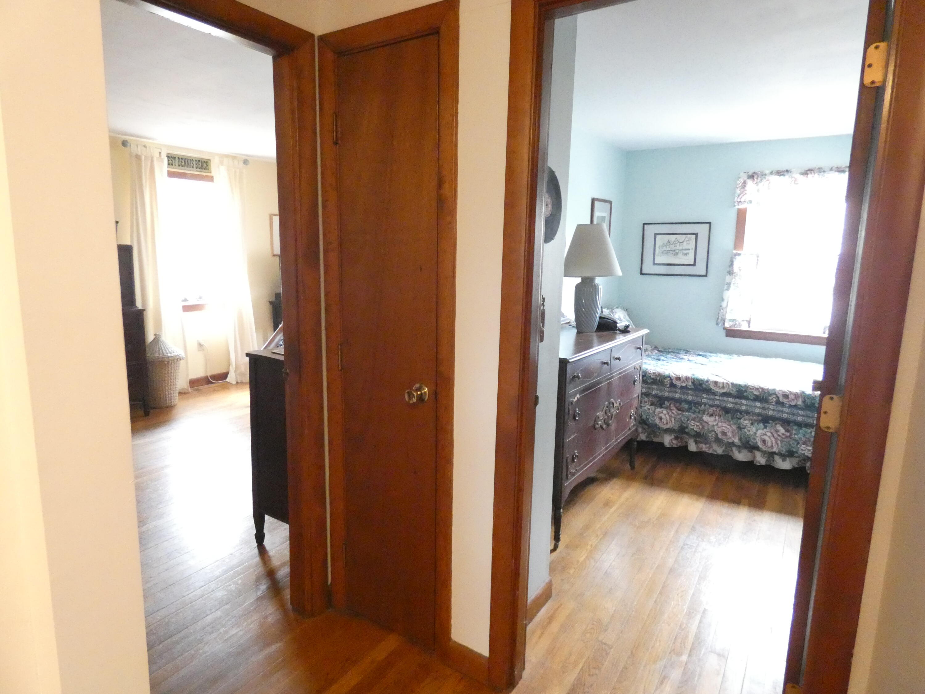 188 Swan River Road West Dennis, MA 02670 - Photo 17 of 39 a view of bedroom with wooden floor