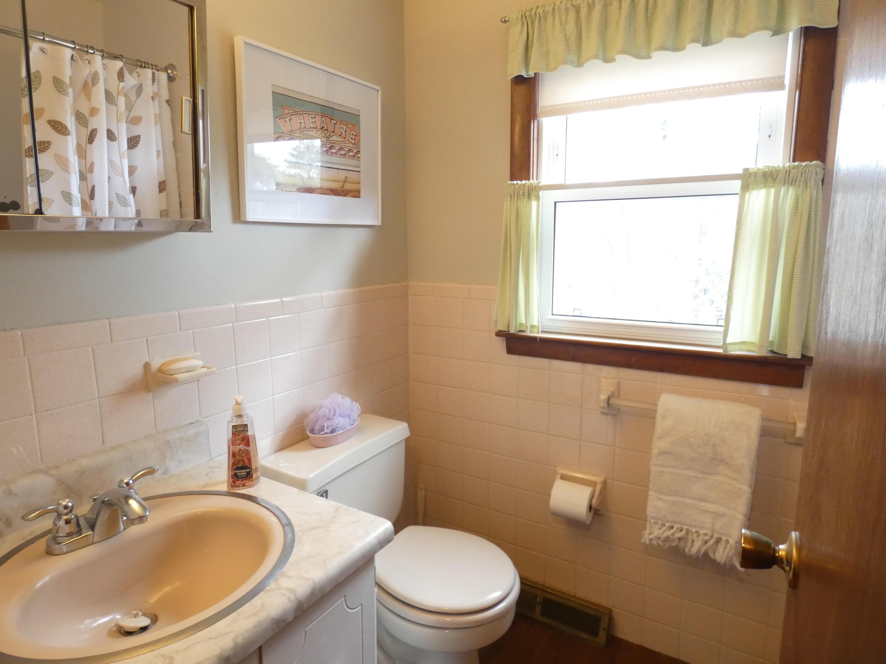188 Swan River Road West Dennis, MA 02670 - Photo 18 of 39 a bathroom with a sink a toilet and a mirror