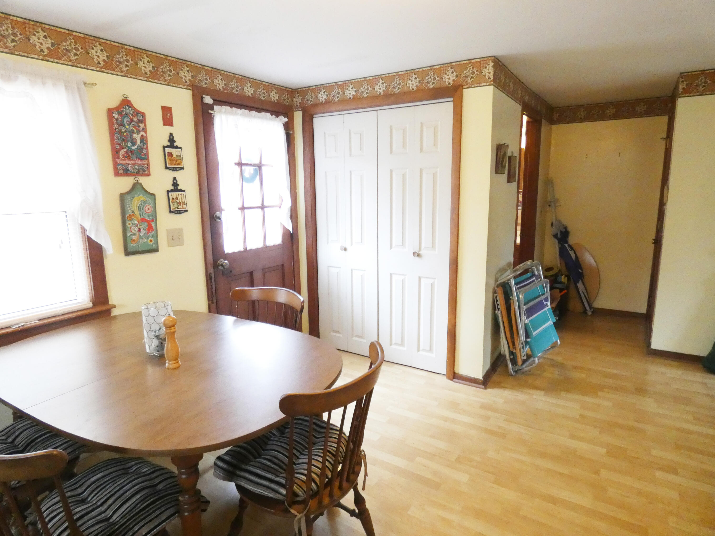 188 Swan River Road West Dennis, MA 02670 - Photo 24 of 39 a view of a dining room with furniture and a window