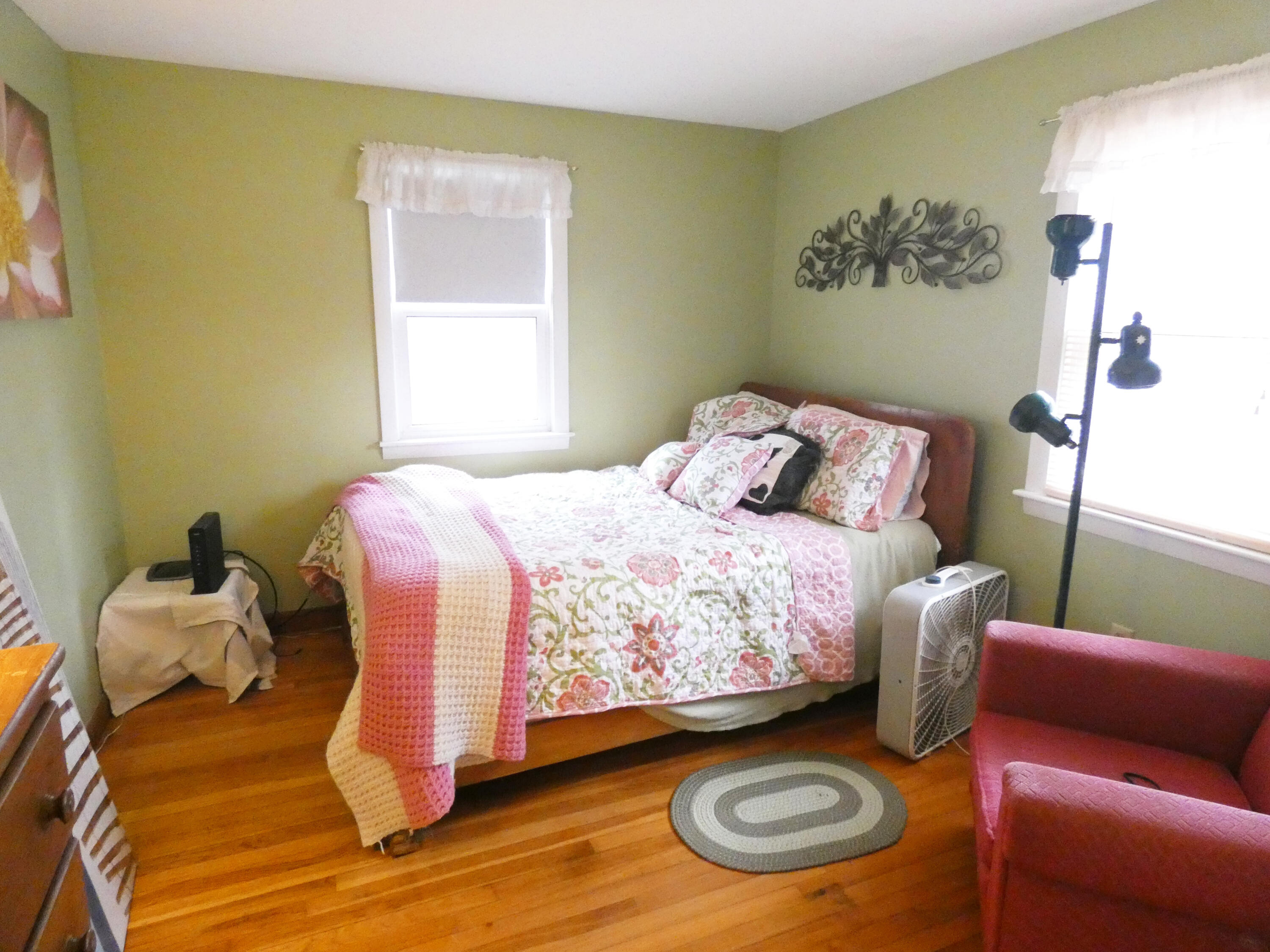 188 Swan River Road West Dennis, MA 02670 - Photo 27 of 39 a bedroom with a bed and a chair