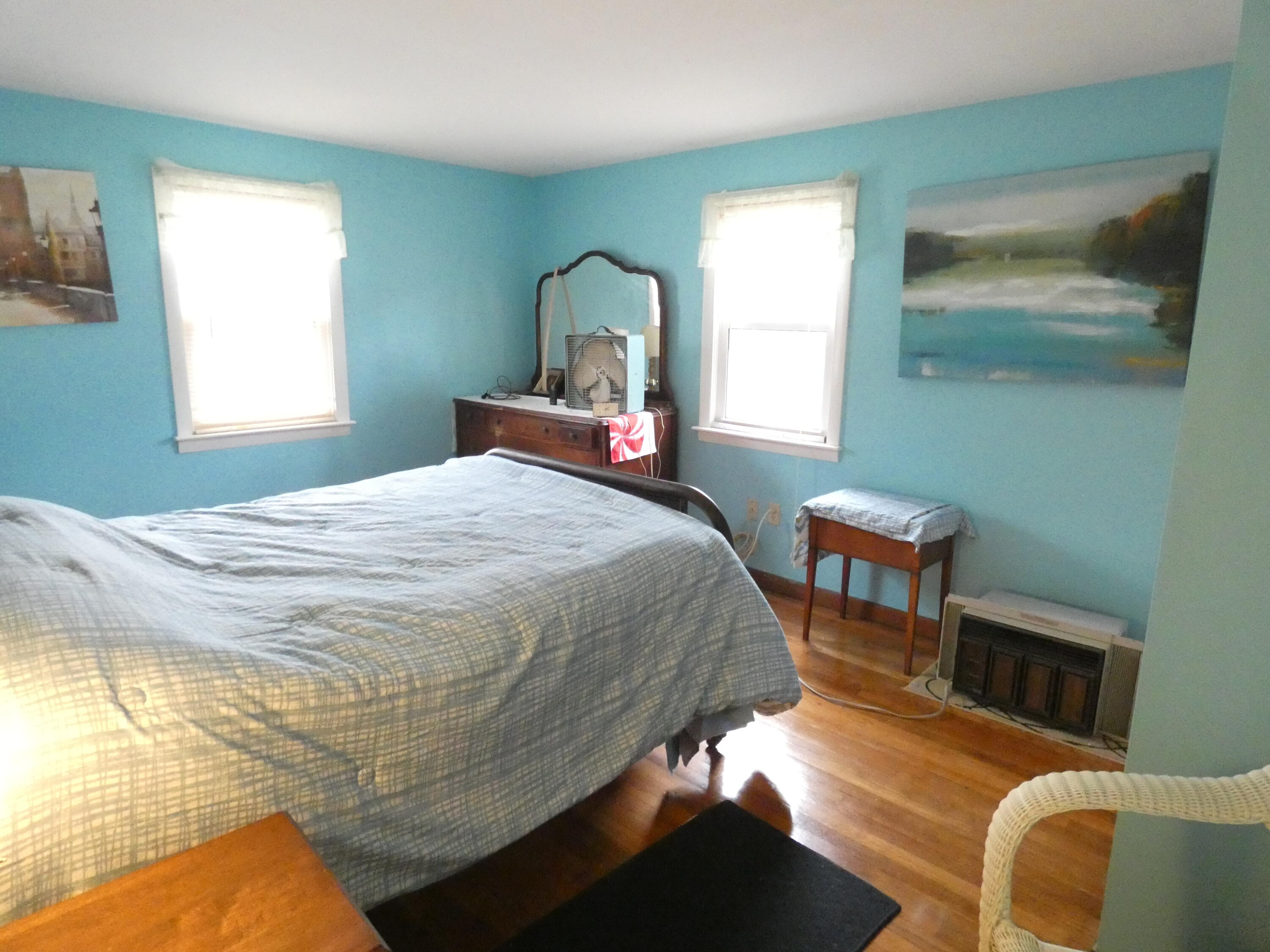 188 Swan River Road West Dennis, MA 02670 - Photo 29 of 39 a bedroom with a bed wooden floor and window