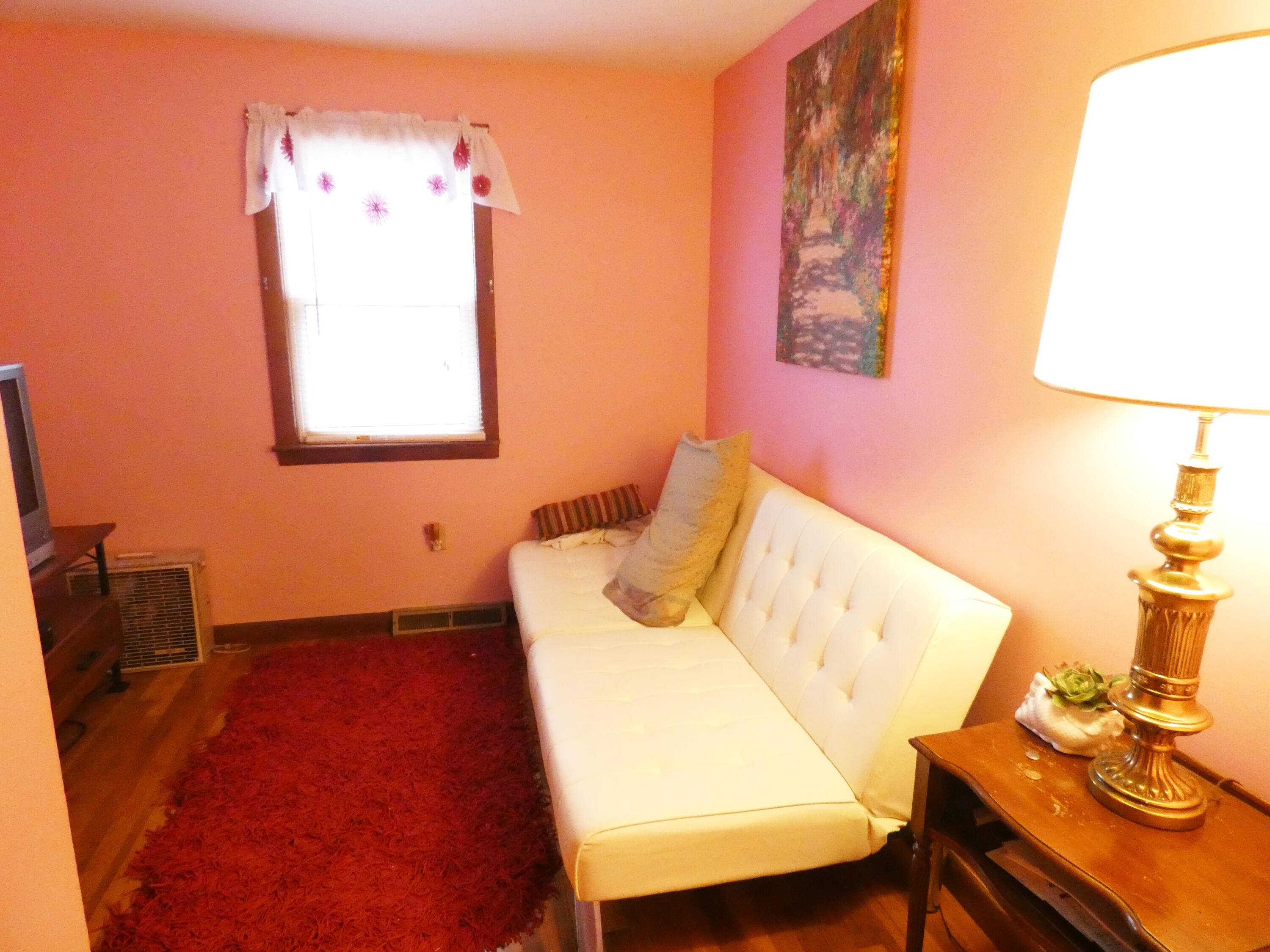 188 Swan River Road West Dennis, MA 02670 - Photo 34 of 39 a living room with furniture and a wooden floor