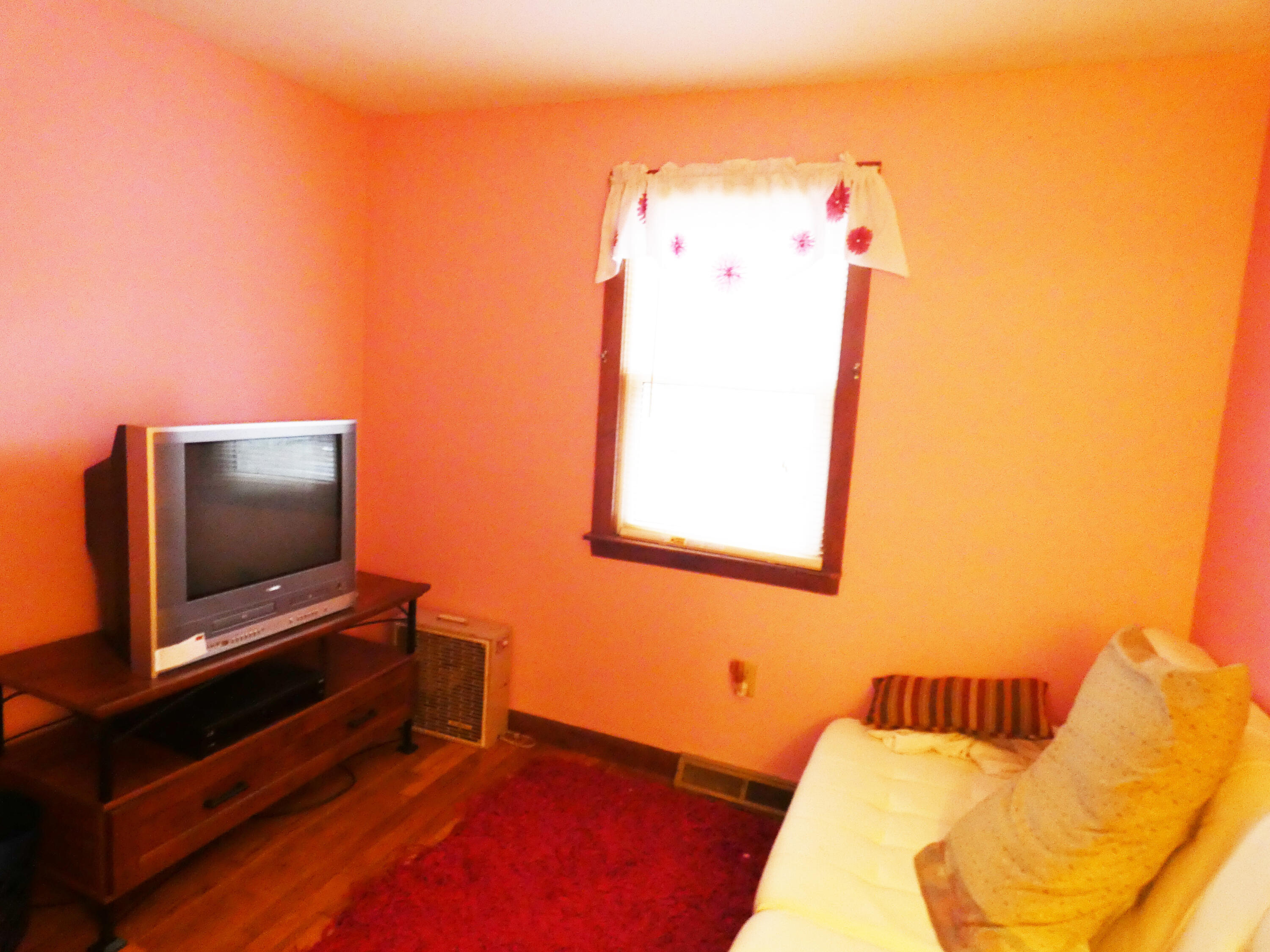 188 Swan River Road West Dennis, MA 02670 - Photo 35 of 39 a bedroom with a bed and a flat screen tv