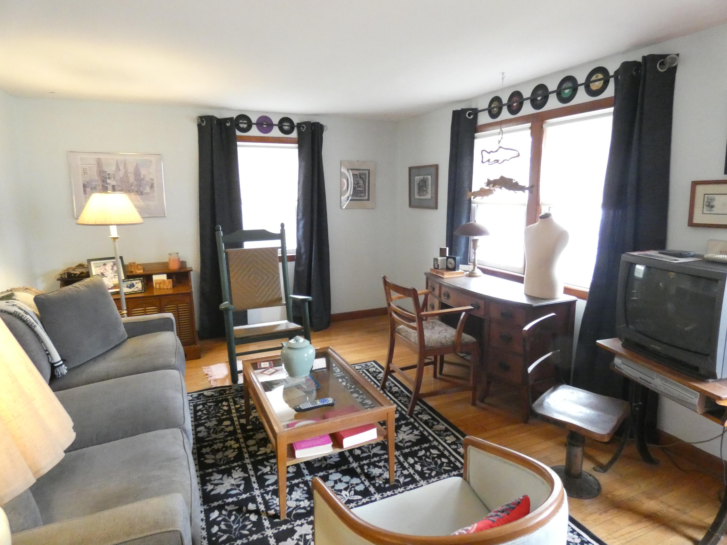188 Swan River Road West Dennis, MA 02670 - Photo 4 of 39 a living room with furniture and a flat screen tv