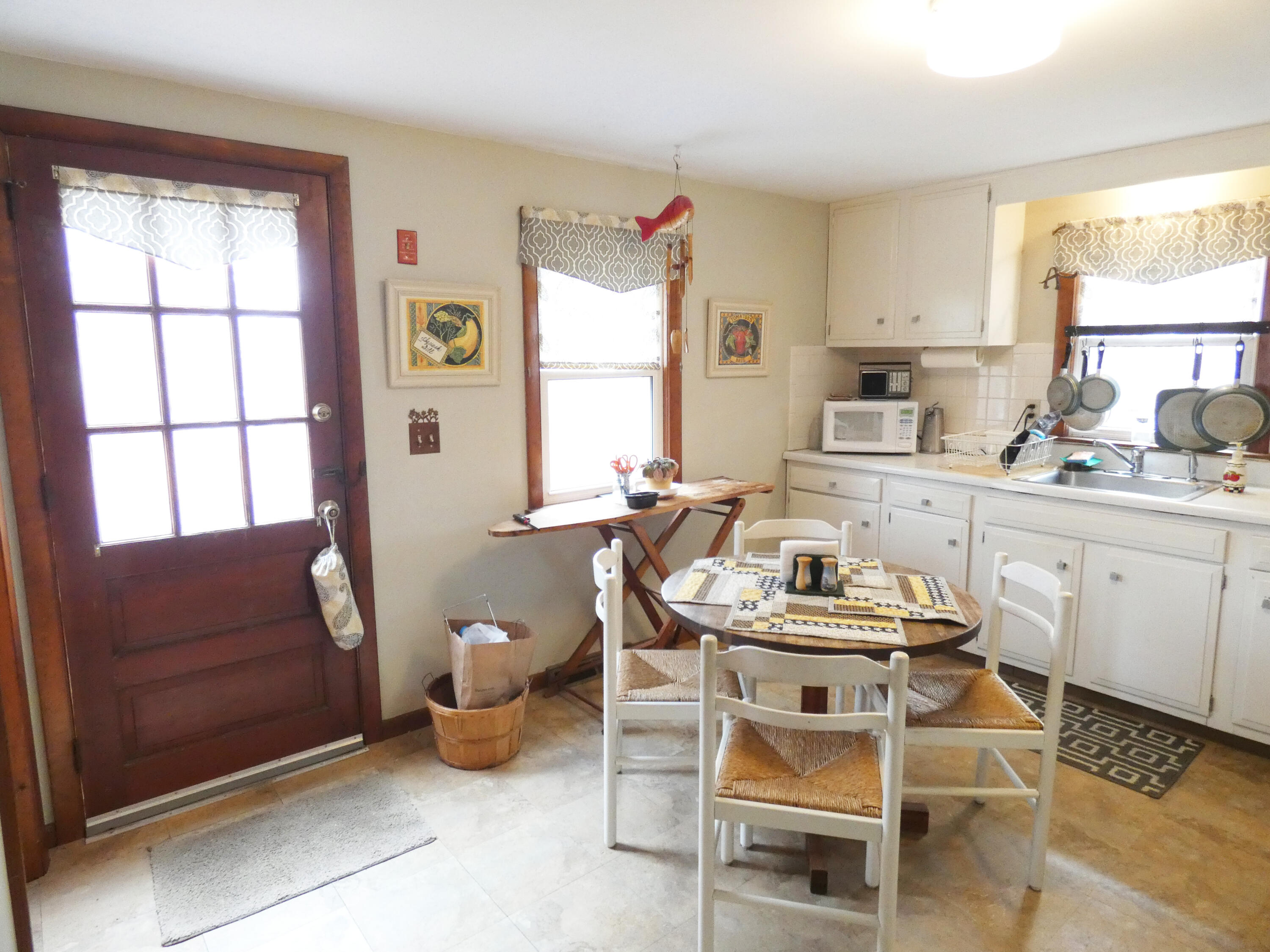 188 Swan River Road West Dennis, MA 02670 - Photo 6 of 39 a living room with furniture a flat screen tv and a window