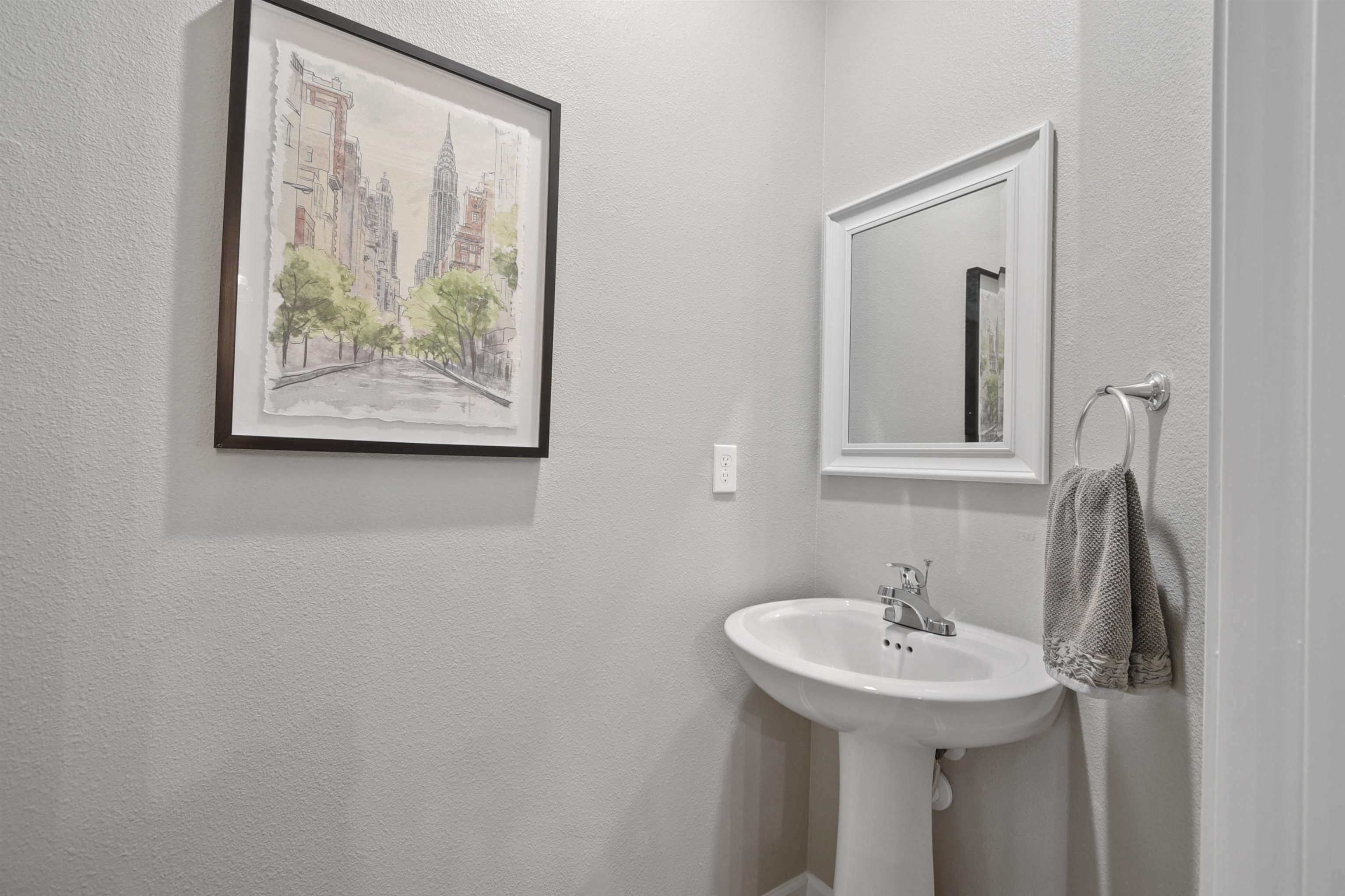 105 Ridge Lake Road St. Augustine, FL 32086 - Photo 29 of 34 a bathroom with a sink and a mirror