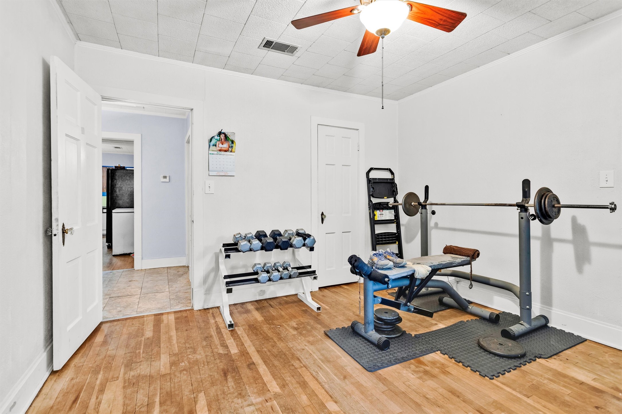 1720 18th Street Huntsville, TX 77340 - Photo 19 of 37 a view of a room with gym equipment