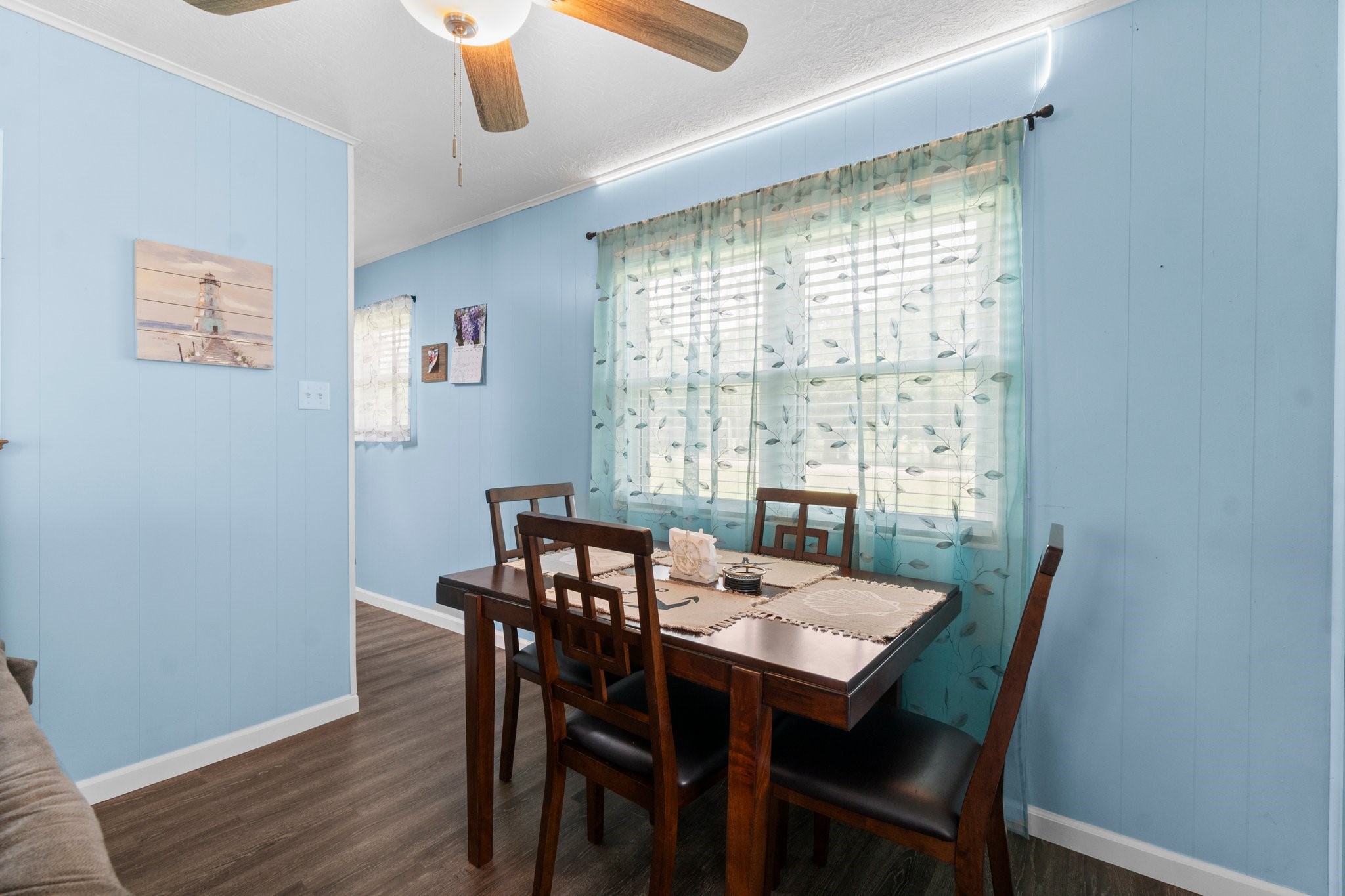21 Clearview Point Blank, TX 77364 - Photo 15 of 43 a view of a dining room with furniture window and wooden floor