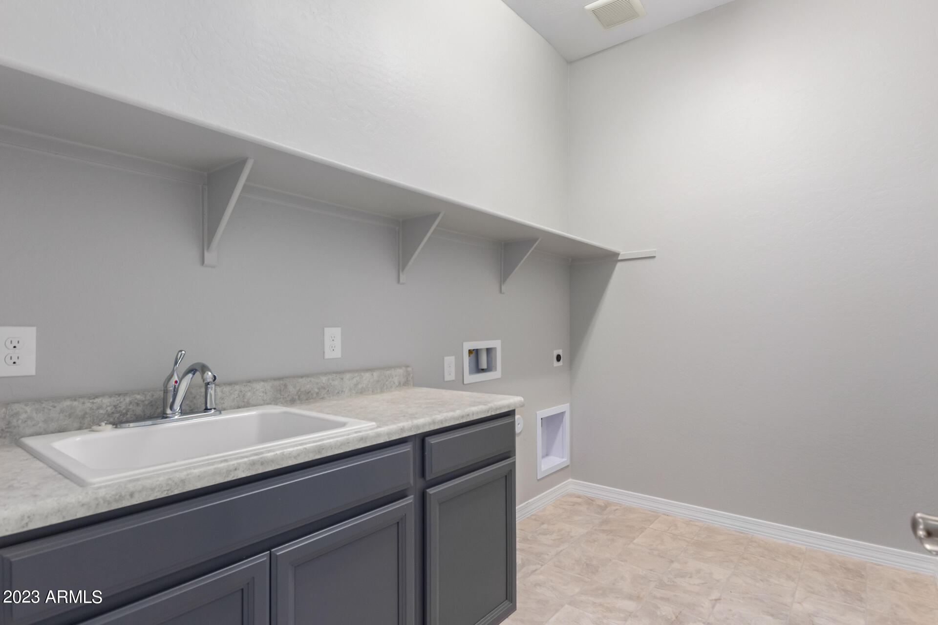 9983 Harvest Road Florence, AZ 85132 - Photo 18 of 23 Laundry