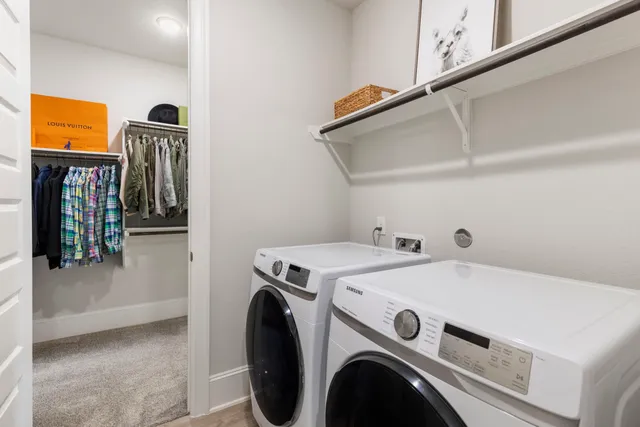 a utility room with dryer and washer
