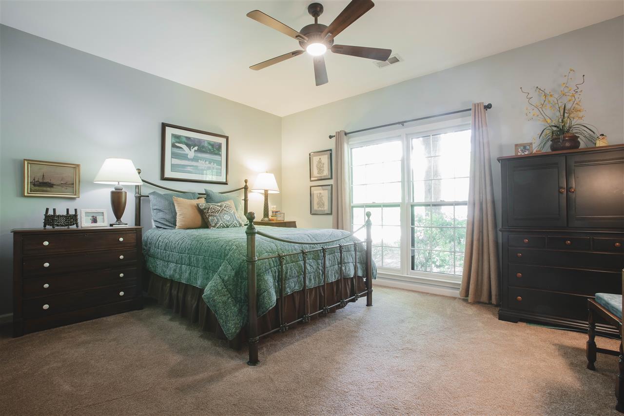 2186 Sunset Road Germantown, TN 38138 - Photo 16 of 25 Good sized secondary bedroom down with en suite bath. Perfect for guests, nursery, home office...whatever you need.