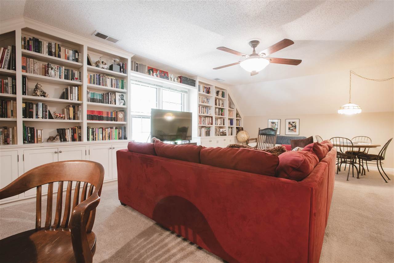 2186 Sunset Road Germantown, TN 38138 - Photo 23 of 25 Bonus room up features custom cabinetry and room for everything else too. Owners have a big sectional, game table, daybed and a full sized desk. Yet another room you'll love.