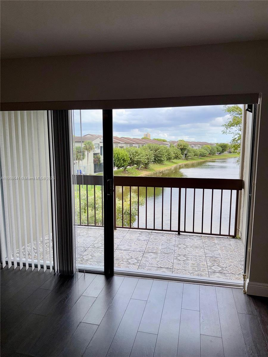 10288 Northwest 9th St Circle, Unit 307 Miami, FL 33172 - Photo 4 of 14 a view of a porch