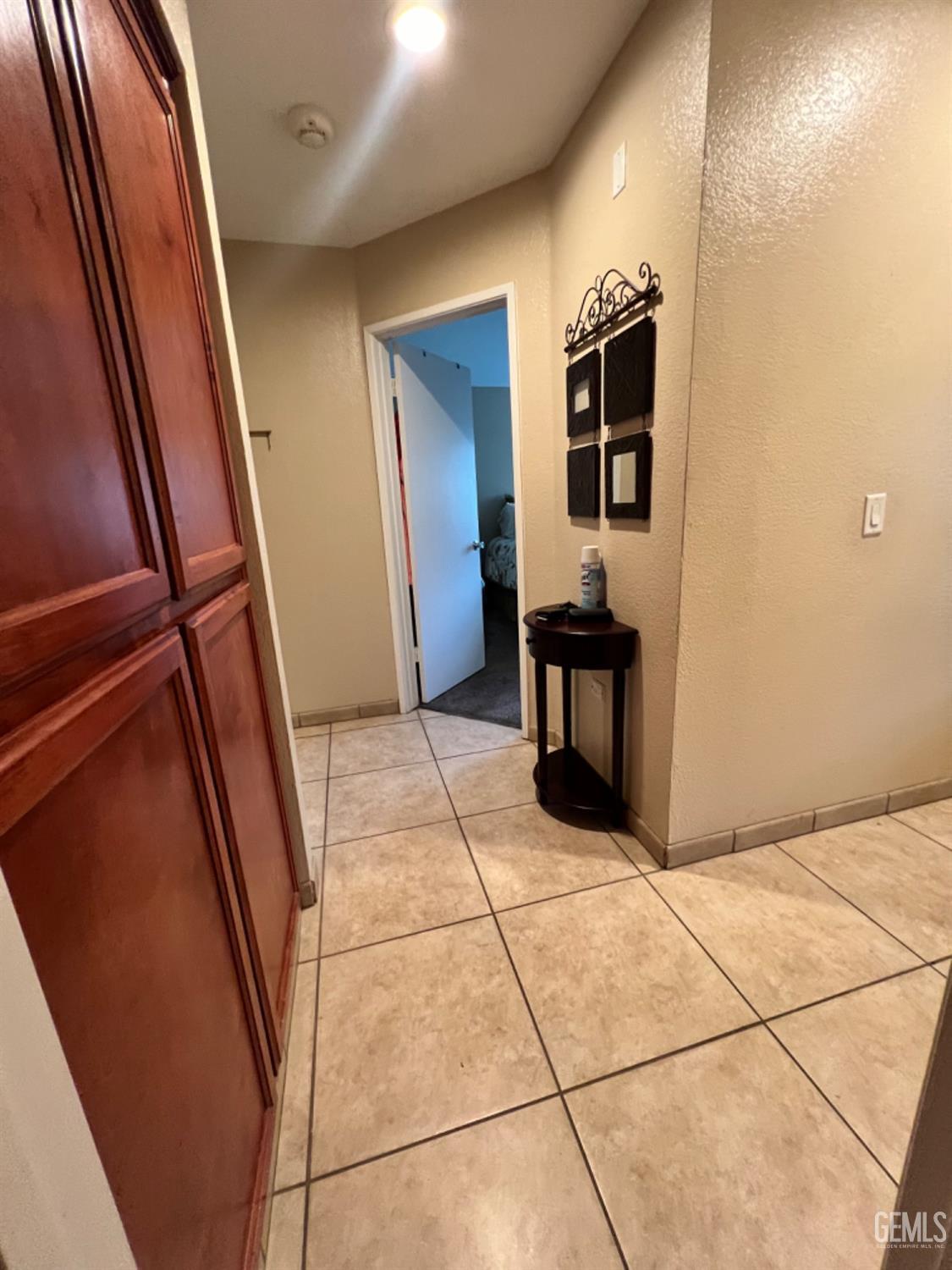 Undisclosed Address Bakersfield, CA 93307 - Photo 12 of 19 a view of a hallway with seating area