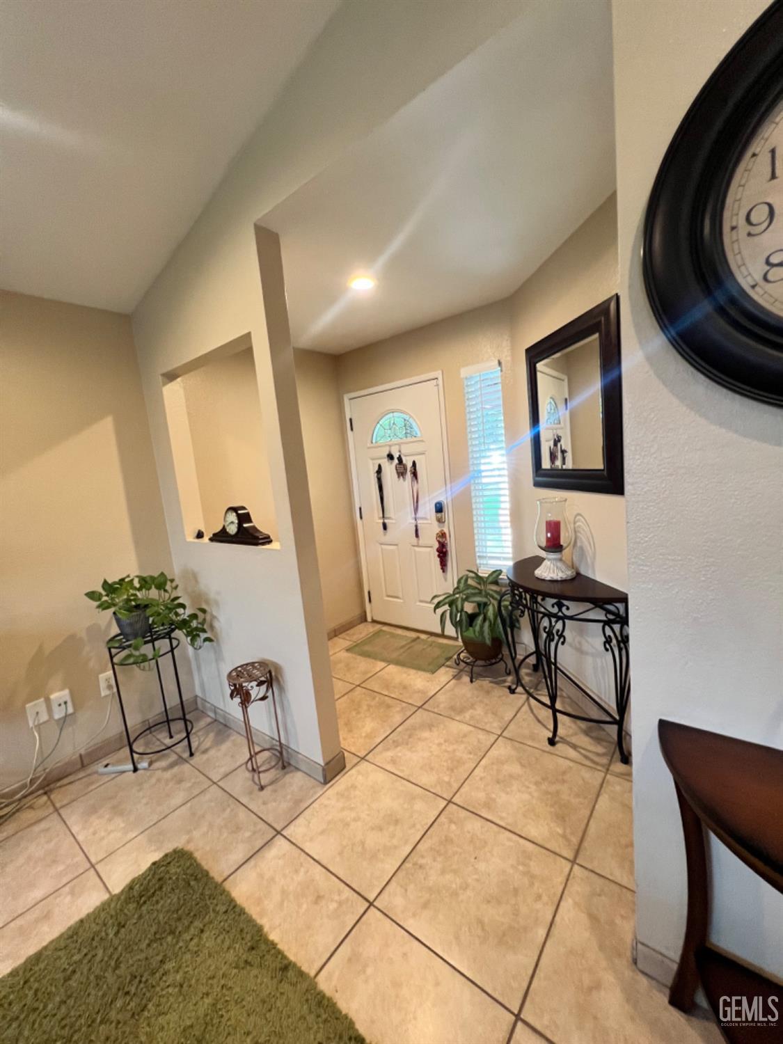 Undisclosed Address Bakersfield, CA 93307 - Photo 7 of 19 a view of a livingroom with furniture and lounge chair
