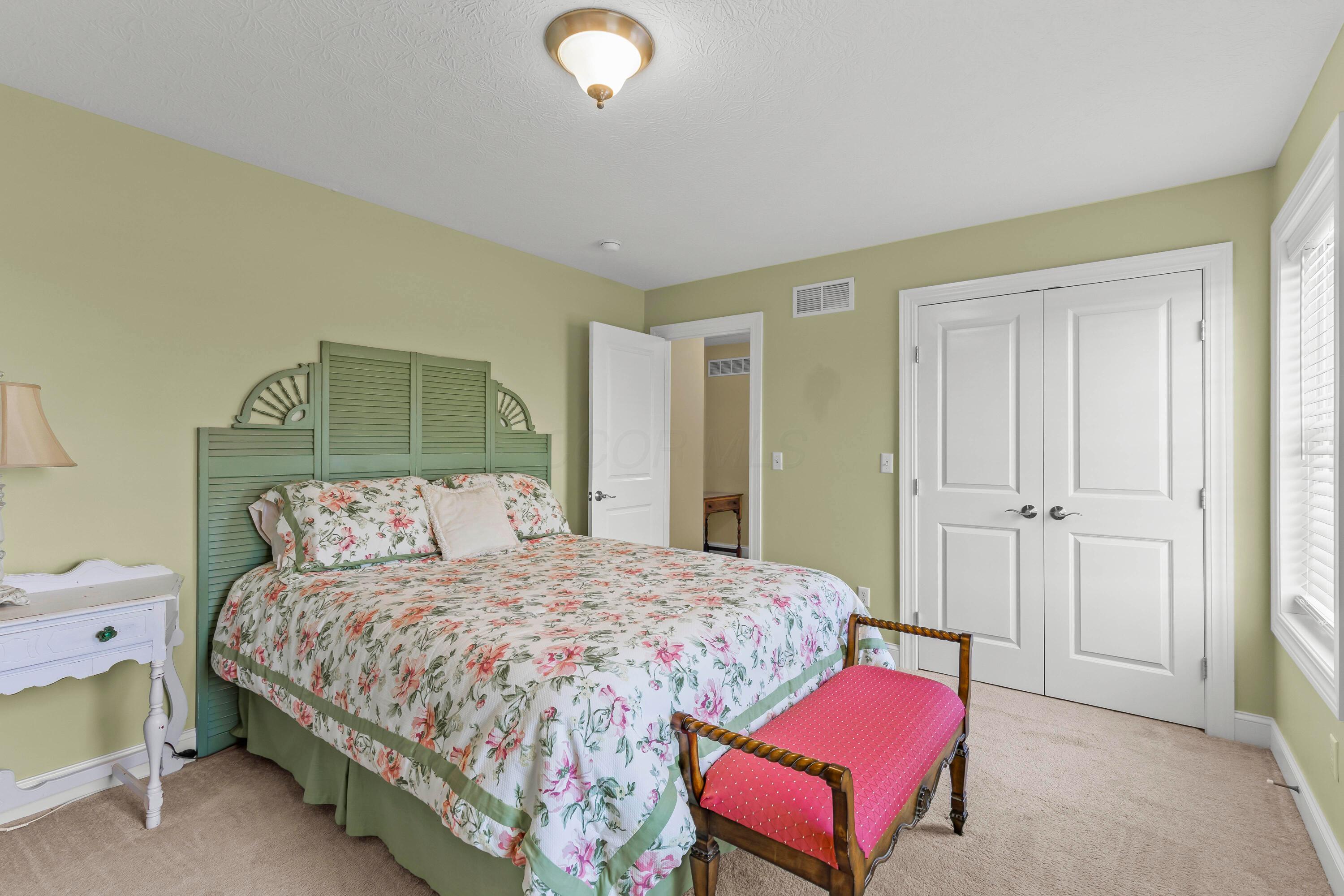 3582 Panhandle Road Delaware, OH 43015 - Photo 15 of 65 • Light sand carpet • Sage painted walls • Ceiling light • Lighted closet with (2) doors • Headboard does not remain • 2” blinds