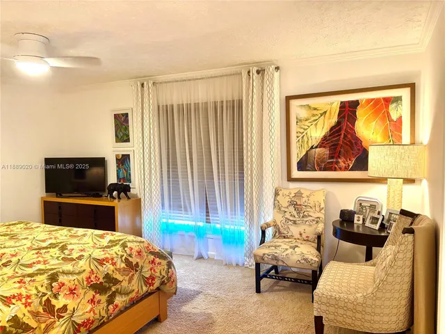 a front view of a house with a large window