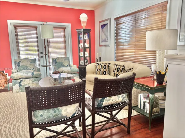 a living room with furniture and window