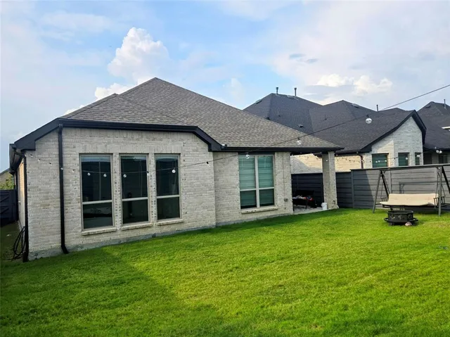 a house view with a garden space