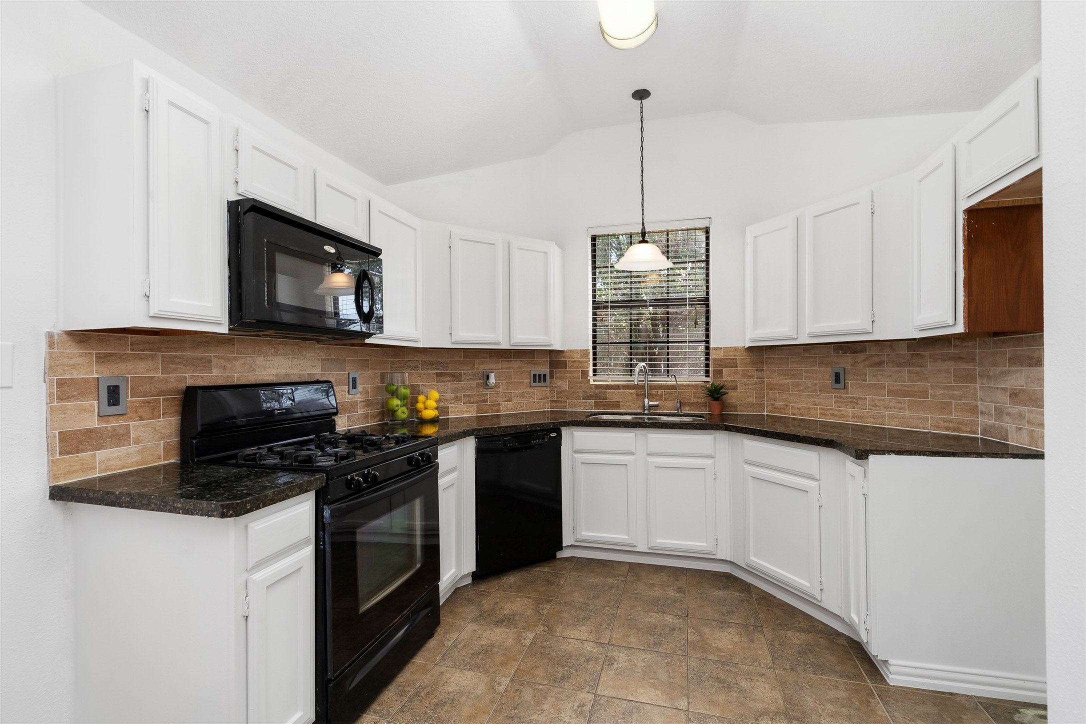 22835 Sherioaks Lane Spring, TX 77389 - Photo 5 of 12 The chef will love cooking in this functional kitchen.