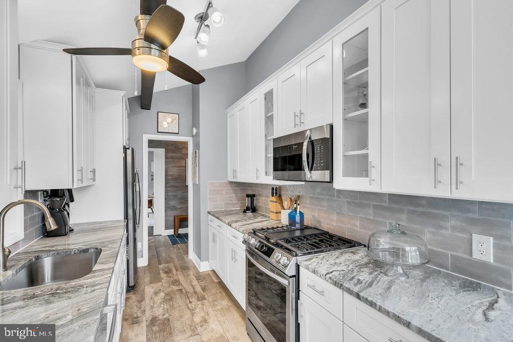 4380 Province Line Road Princeton, NJ 08540 - Photo 18 of 48 Sleek modern kitchen with elegant finishes.