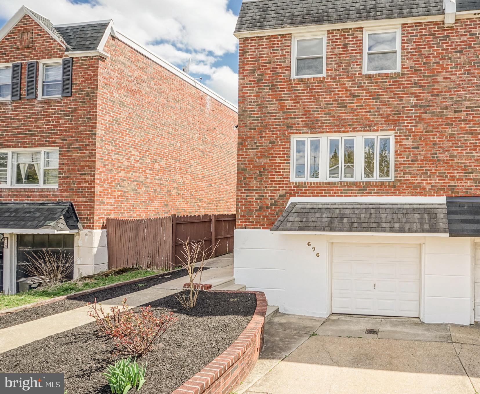 676 Renz Street Philadelphia, PA 19128 - Photo 3 of 36 Exterior Front with deep driveway