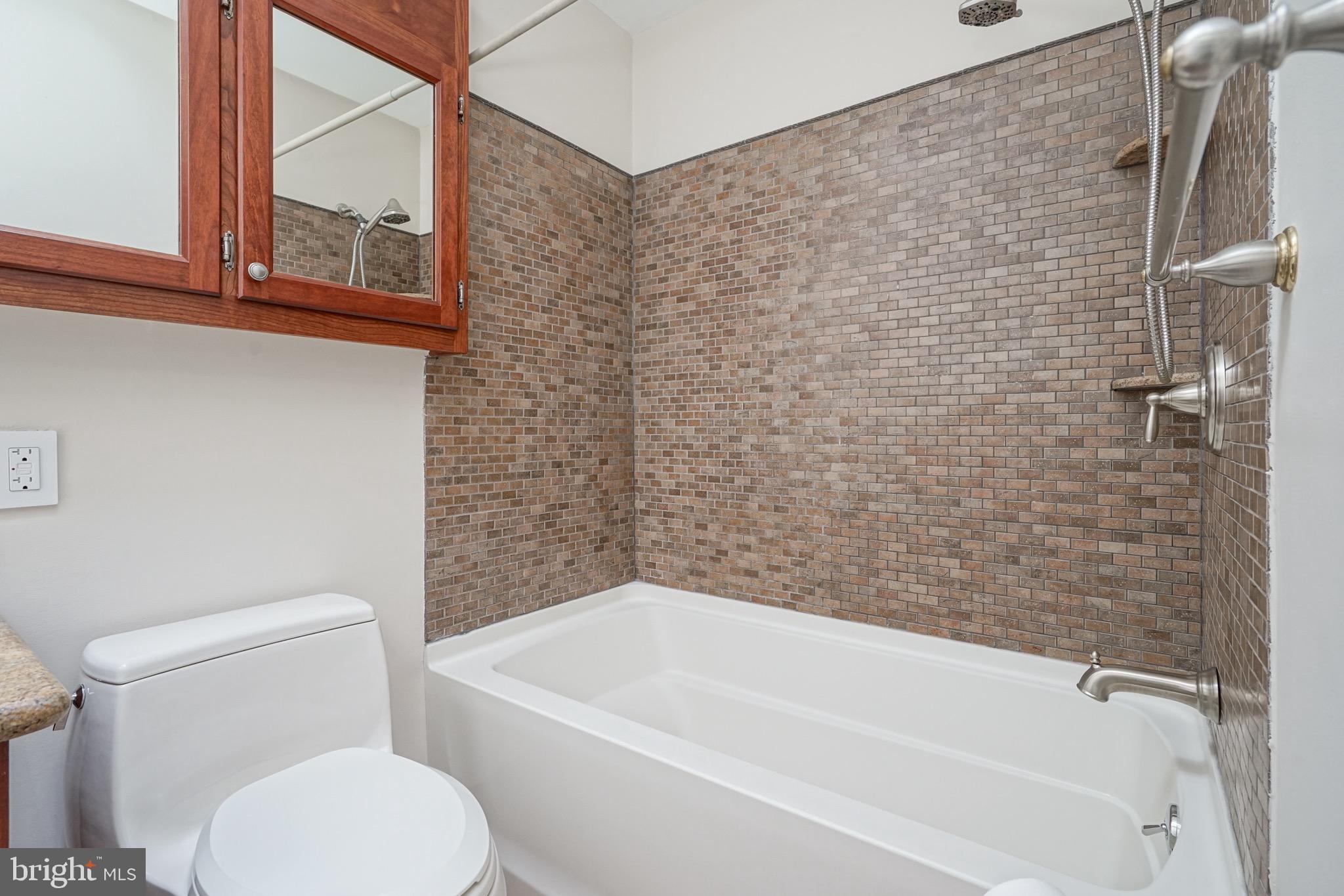 676 Renz Street Philadelphia, PA 19128 - Photo 21 of 36 Main Bath with custom cabinetry