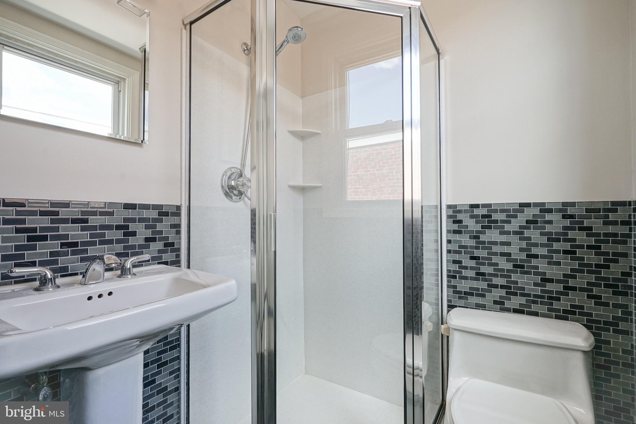 676 Renz Street Philadelphia, PA 19128 - Photo 26 of 36 Master Bathroom with ceramic tile and stall shower