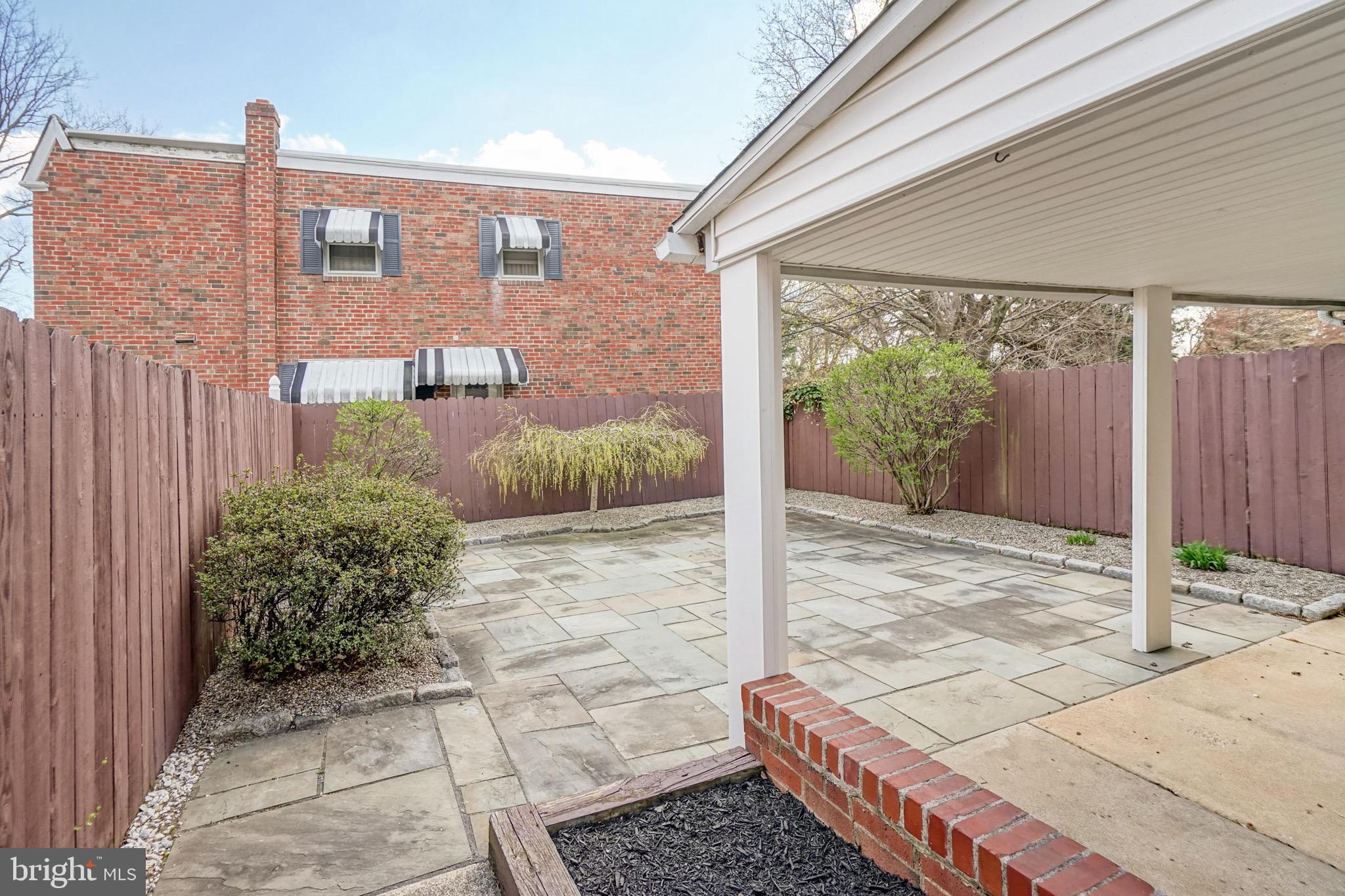 676 Renz Street Philadelphia, PA 19128 - Photo 33 of 36 Private backyard with large flagstone pavers