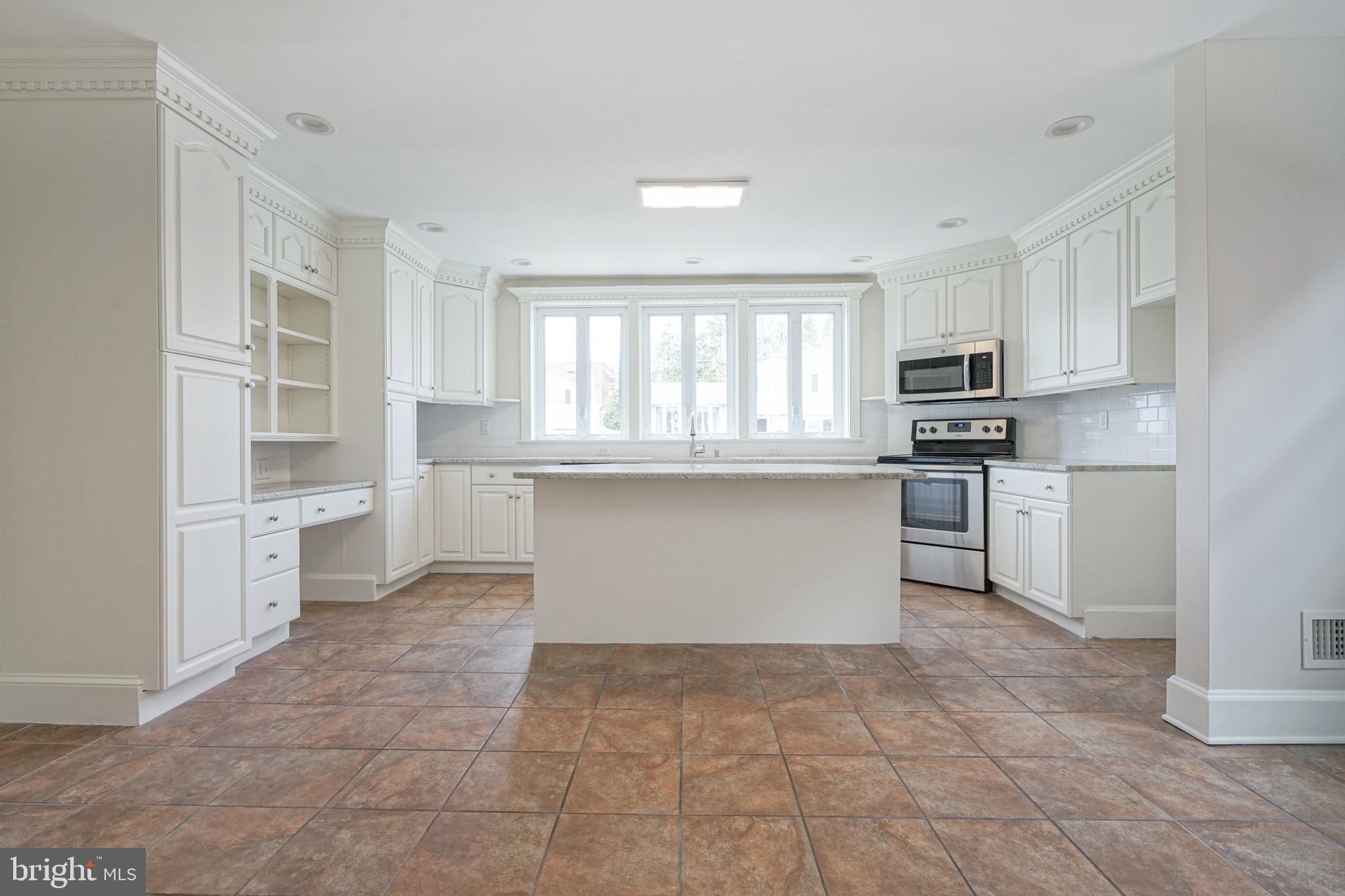676 Renz Street Philadelphia, PA 19128 - Photo 7 of 36 Beautifully renovated kitchen with island