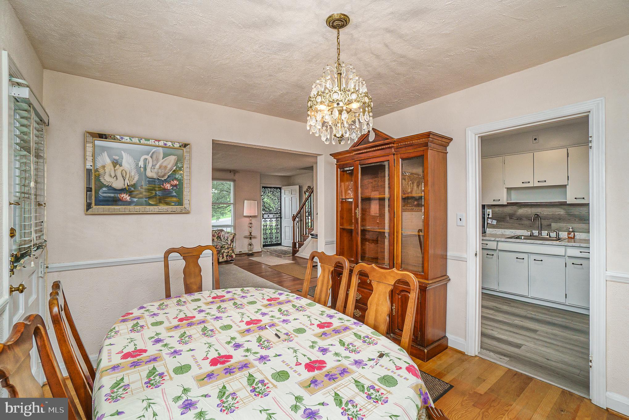 1905 Hillcrest Road Baltimore, MD 21207 - Photo 11 of 26 Dining room with wood floor