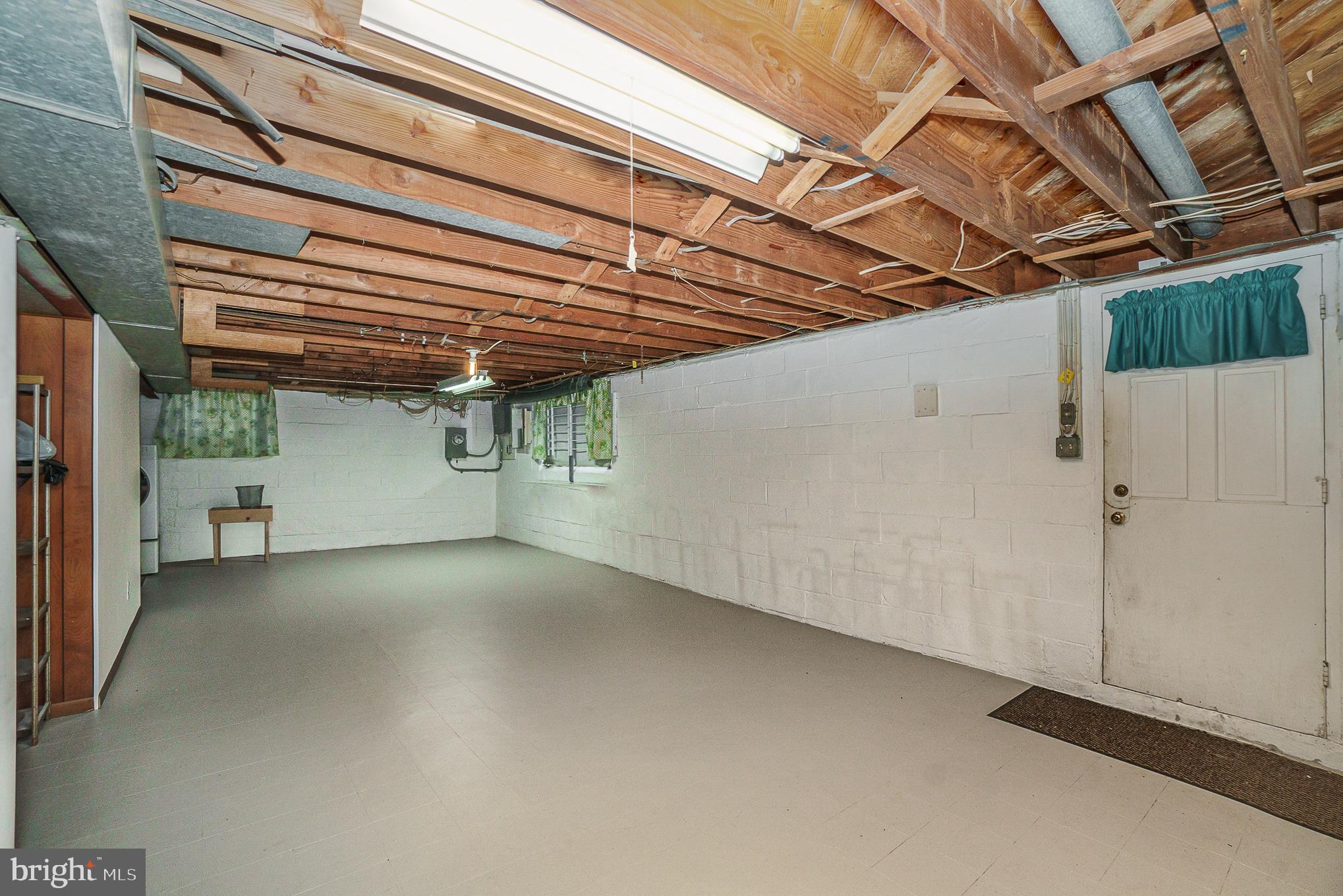 1905 Hillcrest Road Baltimore, MD 21207 - Photo 24 of 26 Full basement with exit