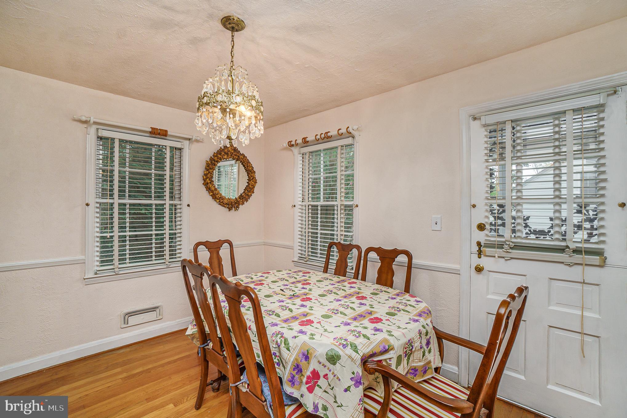 1905 Hillcrest Road Baltimore, MD 21207 - Photo 10 of 26 Dining room with door to side porch